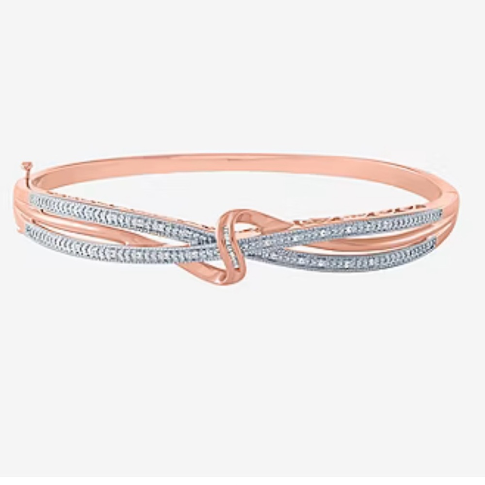 1/10 CT. T.W. Diamond Crossover Rose Colored Bangle Bracelet in Sterling Silver